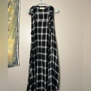 Long, black and white plaid sleeveless duster